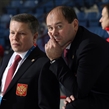ST. CATHARINES, CANADA - JANUARY 15: Russia head coach Alexander Ulyankio and assistant coach Alexei Chistyakov look on during the warm-up prior to bronze medal game action against Sweden at the 2016 IIHF Ice Hockey U18 Women's World Championship. (Photo by Jana Chytilova/HHOF-IIHF Images)

